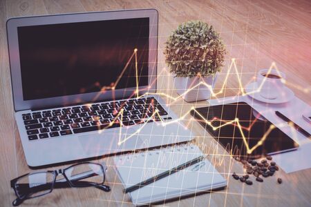 Multi exposure of forex chart and work space with computer. Concept of international online trading.の写真素材