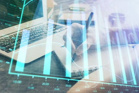 Forex chart displayed on womans hand taking notes background. Concept of research. Multi exposure