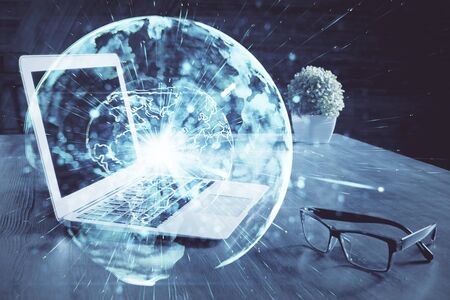 Multi exposure of business theme icons and work space with computer background. Concept of success.の写真素材