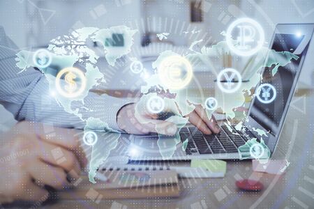 Multi exposure of stock market chart with man working on computer on background. Concept of financial analysis.の写真素材