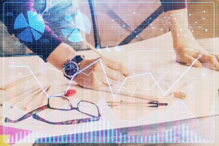 Multi exposure of man standing and planing investment with stock market forex chart background....