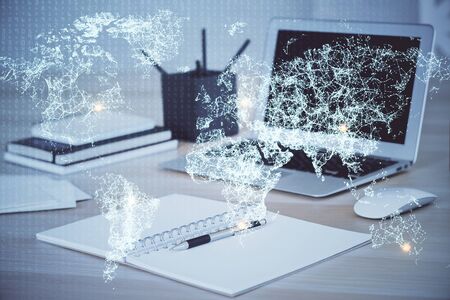 Computer on desktop with social network theme icon. Multi exposure. Concept of international connections.の写真素材