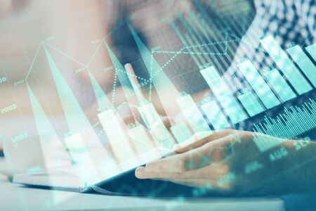 Multi exposure of two men planing investment with stock market forex chart background. Concept of...
