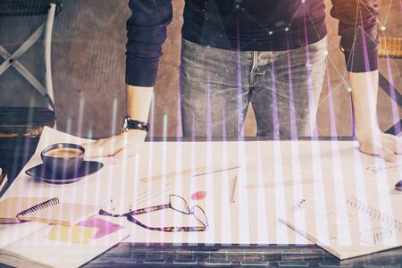 Multi exposure of man standing and planing investment with stock market forex chart background. Concept of research and trading.の写真素材
