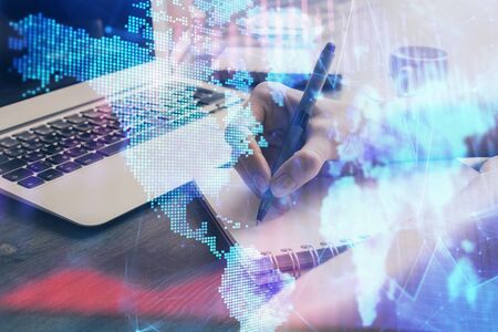 Forex chart displayed on woman's hand taking notes background. Concept of research. Multi exposure