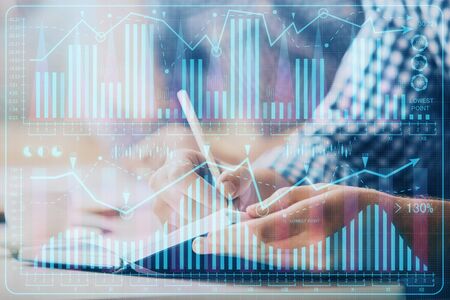 Multi exposure of two men planing investment with stock market forex chart background. Concept of research and trading.の写真素材