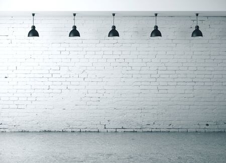 Brick room with blank wall, lamps  and concrete floor. Presentation concept. Mock up, 3D Renderingの写真素材