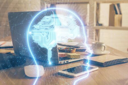 Double exposure of work table with computer and brain sketch hologram. Brainstorming concept.