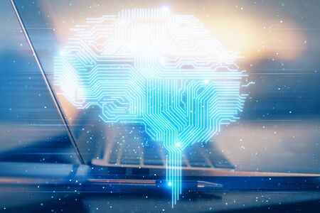 Multi exposure of work table with computer and brain hologram. Brainstorm concept.