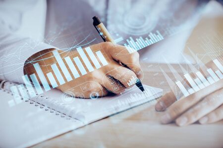 Multi exposure of man planing investment with stock market forex chart background. Concept of research and trading.の写真素材