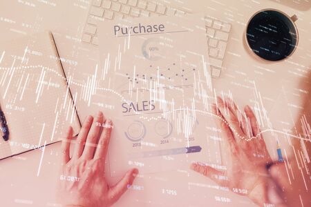 FOREX chart multi exposure with work table background. Top View. Concept of success.の写真素材