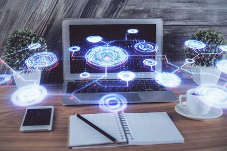 Computer on desktop with social network theme icon. Multi exposure. Concept of international connections.の写真素材