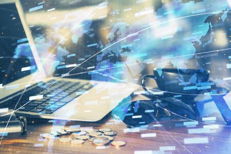 Double exposure of computer and technology theme hologram. Concept of freelance work.