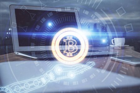 Double exposure of blockchain theme hologram and table with computer background. Concept of bitcoin...
