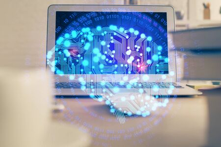 Double exposure of table with computer and brain hologram. Data innovation concept.の写真素材
