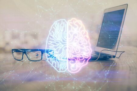 Multi exposure of work table with computer and brain hologram. Brainstorm concept.