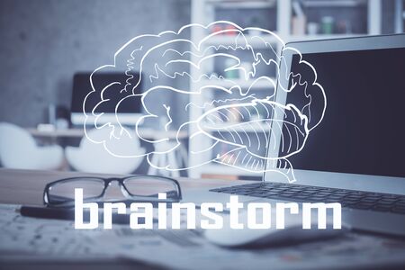Desktop computer background in office and start up theme hologram drawing. Double exposure. Startup concept.の写真素材