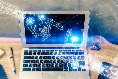 Double exposure of desktop computer and technology theme hologram. Concept of software development.の写真素材