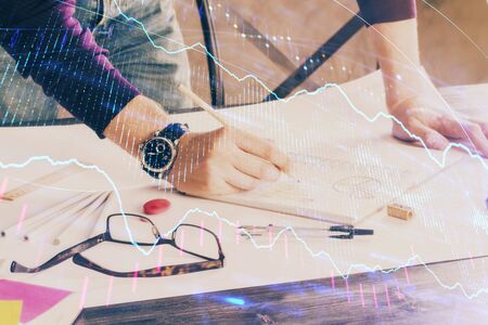 Multi exposure of man standing and planing investment with stock market forex chart background. Concept of research and trading.の写真素材