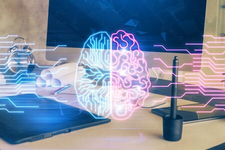 Multi exposure of work space with computer and human brain hologram. Brainstorm concept.