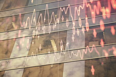 Forex chart on cityscape with tall buildings background multi exposure. Financial research concept.の写真素材