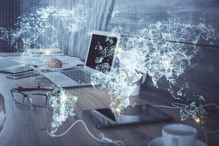 Computer on desktop with social network hologram. Multi exposure. Concept of international people...