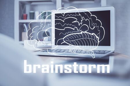 Desktop computer background in office and start up theme hologram drawing. Double exposure. Startup concept.の写真素材