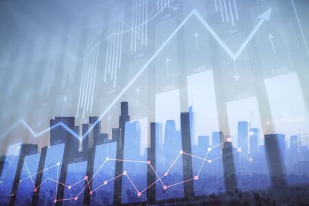 Forex chart on cityscape with skyscrapers wallpaper double exposure. Financial research concept.の写真素材