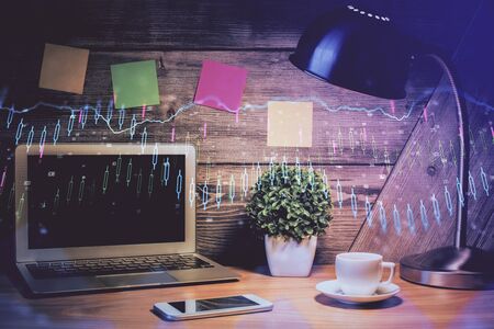 Multi exposure of forex chart and work space with computer. Concept of international online trading.の写真素材
