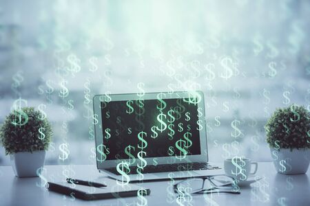 Forex graph hologram on table with computer background. Multi exposure. Concept of financial markets.の写真素材