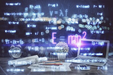 Desktop computer background and formula hologram writing. Double exposure. Education concept.