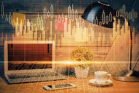 Double exposure of forex graph and work space with computer. Concept of international online trading.の写真素材