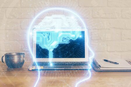 Multi exposure of work table with computer and brain hologram. Brainstorm concept.の写真素材