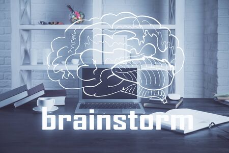 Desktop computer background in office and start up theme hologram drawing. Double exposure. Startup concept.の写真素材