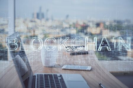 Double exposure of blockchain theme hologram and table with computer background. Concept of bitcoin...