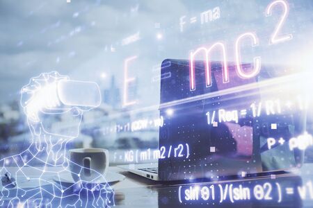 Desktop computer background and formula hologram writing. Double exposure. Education concept.