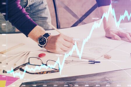 Multi exposure of man standing and planing investment with stock market forex chart background....