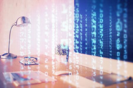 Double exposure of desktop computer and technology theme hologram. Concept of software development.