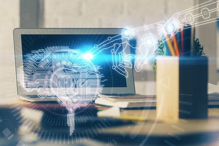 Multi exposure of work space with computer and human brain hologram. Brainstorm concept.