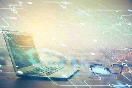Double exposure of computer and technology theme hologram. Concept of freelance work.