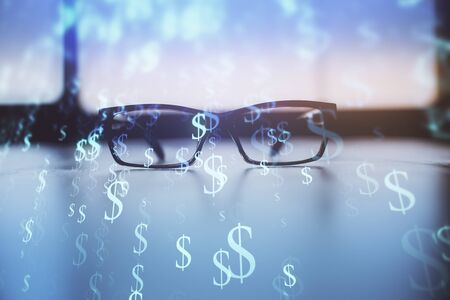 Financial graph hologram with glasses on the table background. Concept of business. Double exposure.の写真素材