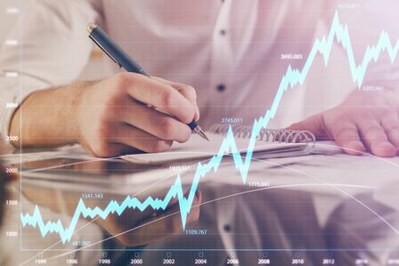 Multi exposure of man planing investment with stock market forex chart background. Concept of...