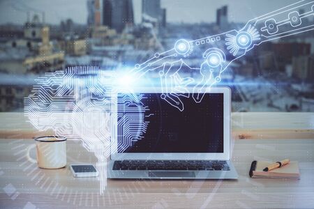 Double exposure of table with computer and brain hologram. Data innovation concept.