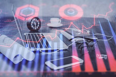 Forex Chart hologram on table with computer background. Double exposure. Concept of financial...