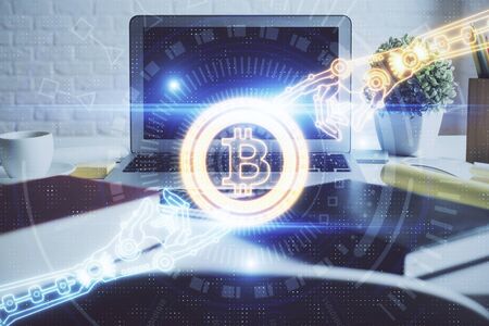 Multi exposure of blockchain and crypto economy theme hologram and table with computer background....