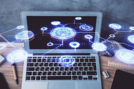 Computer on desktop with social network hologram. Multi exposure. Concept of international people...