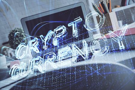 Multi exposure of blockchain and crypto economy theme hologram and table with computer background....