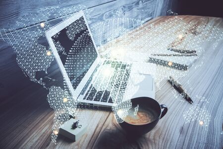 Double exposure of business theme icons and work space with computer background. Concept of success.の写真素材