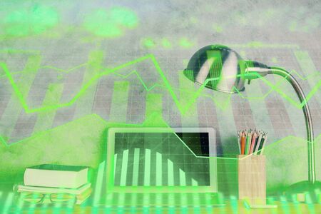 Double exposure of forex graph and work space with computer. Concept of international online trading.の写真素材