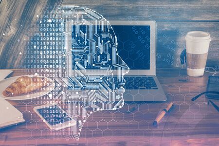 Multi exposure of work table with computer and brain hologram. Brainstorm concept.